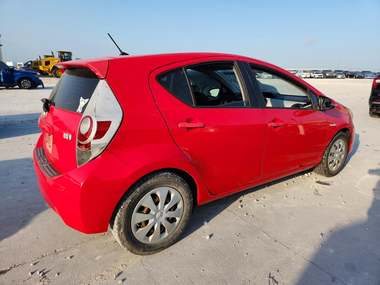 2012 Toyota Prius C Two Red vin: JTDKDTB31C1503220