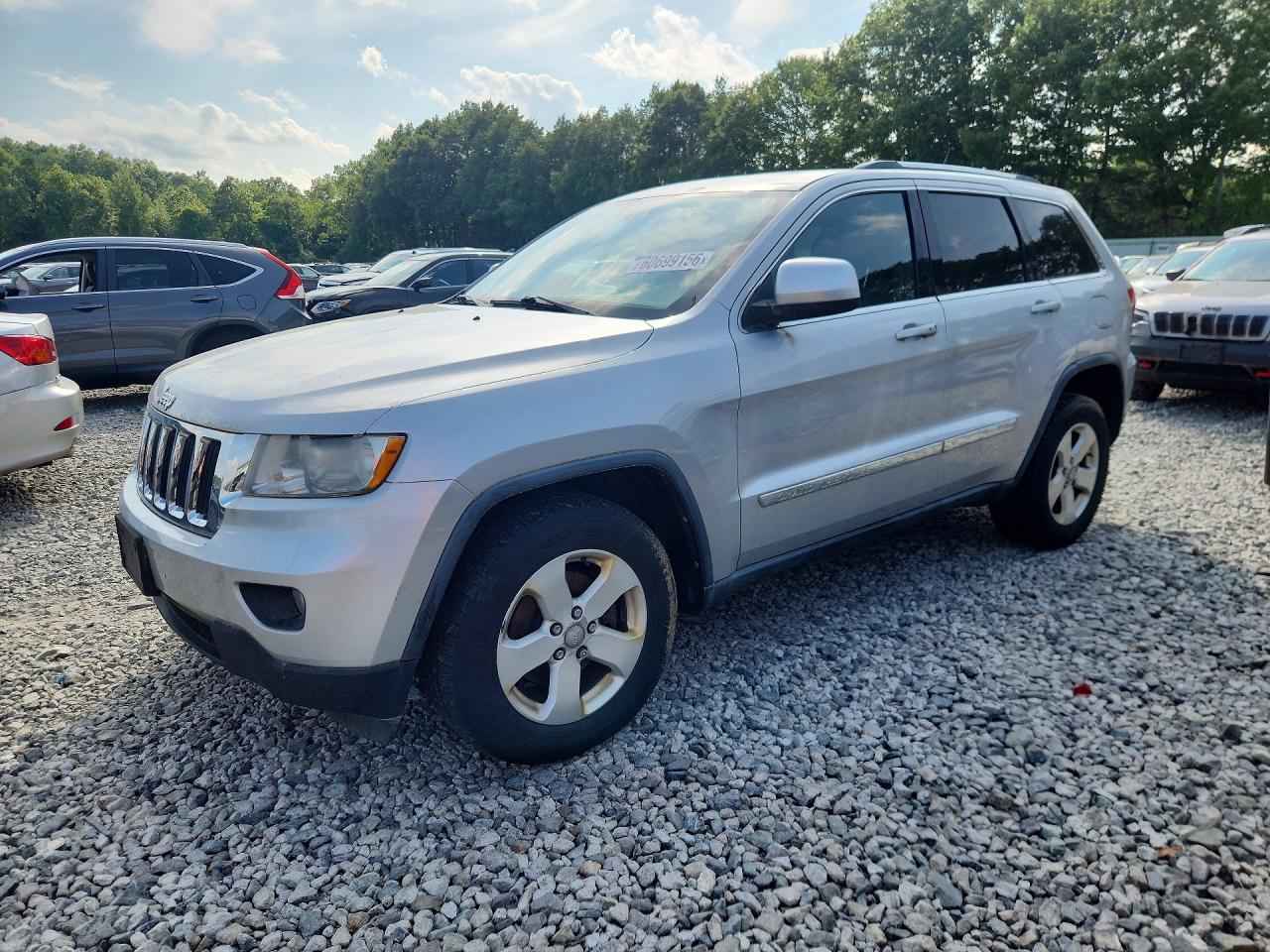 2012 Jeep Grand Cherokee Laredo Серебряный vin: 1C4RJFAGXCC123908