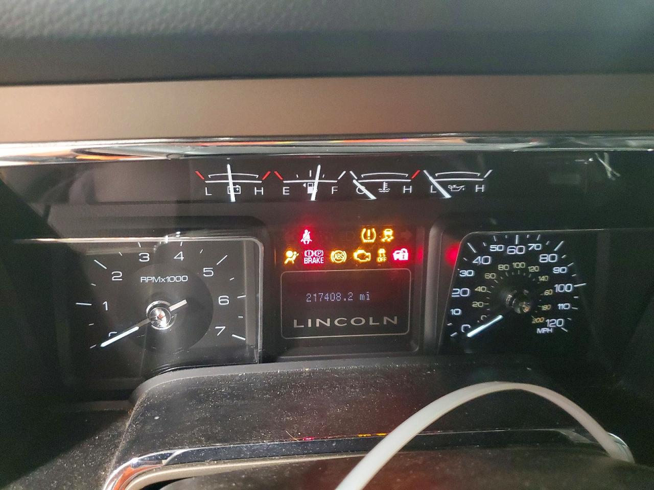 2012 Lincoln Navigator L Серебряный vin: 5LMJJ3J55CEL06382