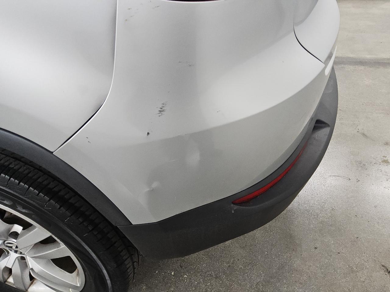 2014 Volkswagen Tiguan S Silver vin: WVGAV3AX9EW603354 Damage: Rear Bumper, Dent(S) W/ Paint Dmg, 7 To 8 Inches