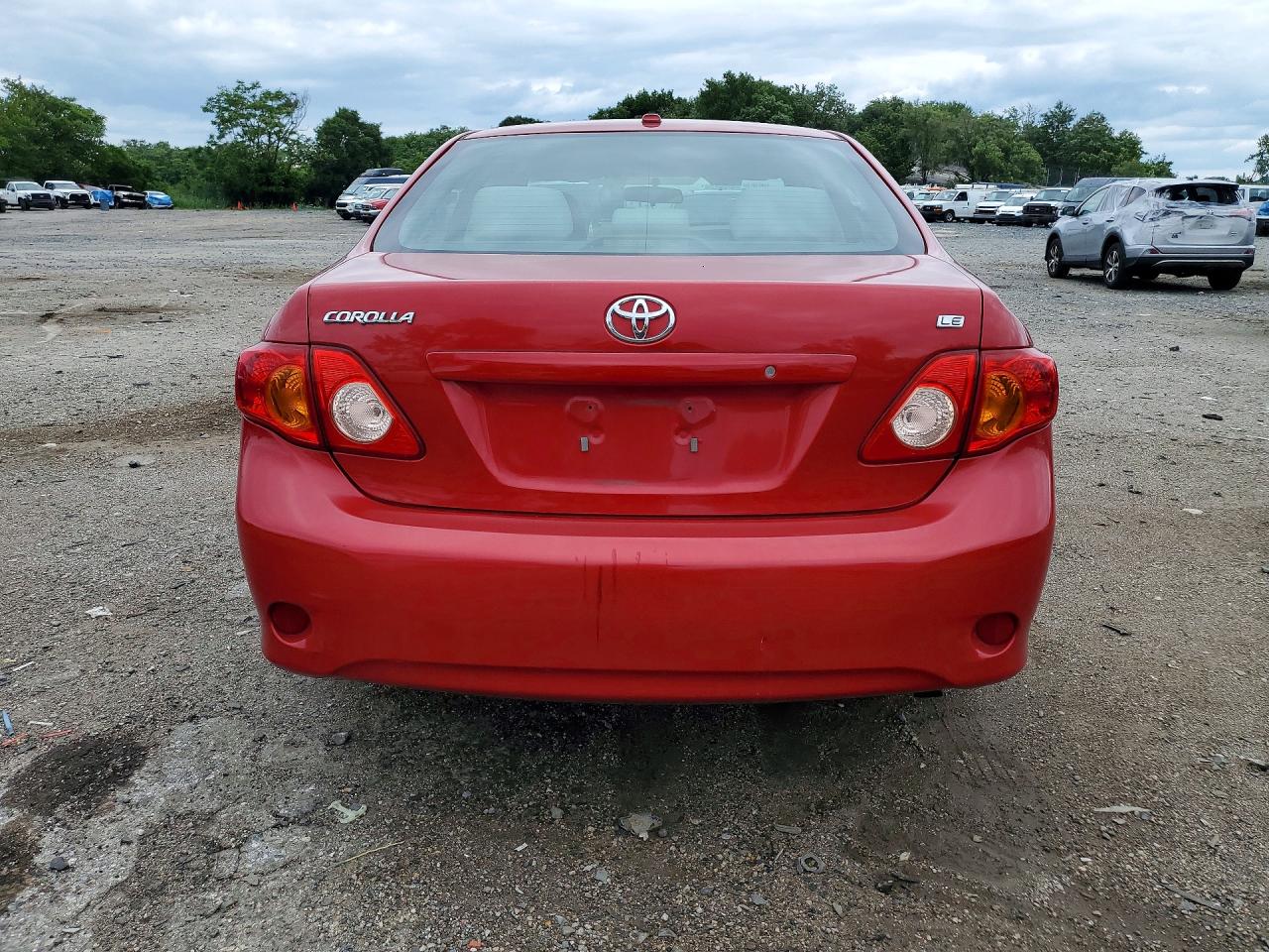 2009 Toyota Corolla Le Red vin: 2T1BU40E19C105715