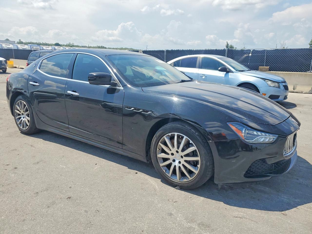 2014 Maserati Ghibli S Black vin: ZAM57RTAXE1090359