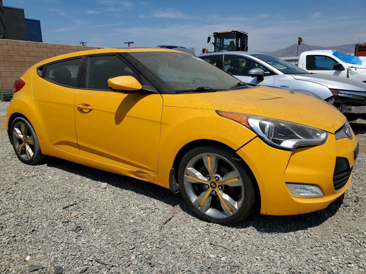 2012 Hyundai Veloster Base Желтый vin: KMHTC6AD2CU030621
