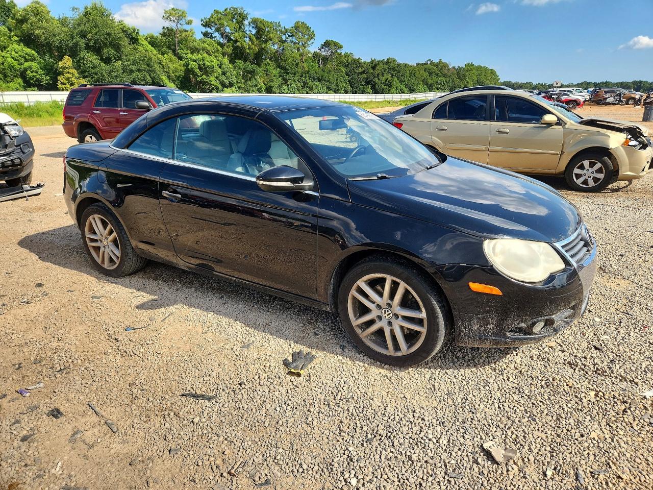 2009 Volkswagen Eos Lux Black vin: WVWFA71F99V014823