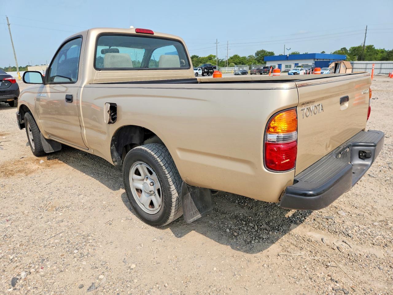 2002 Toyota Tacoma Base Gold vin: 5TENL42N62Z893906