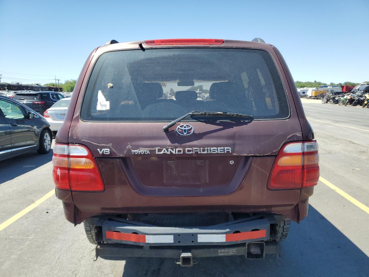 1999 Toyota Land Cruiser    Burgundy vin: JT3HT05JXX0048695