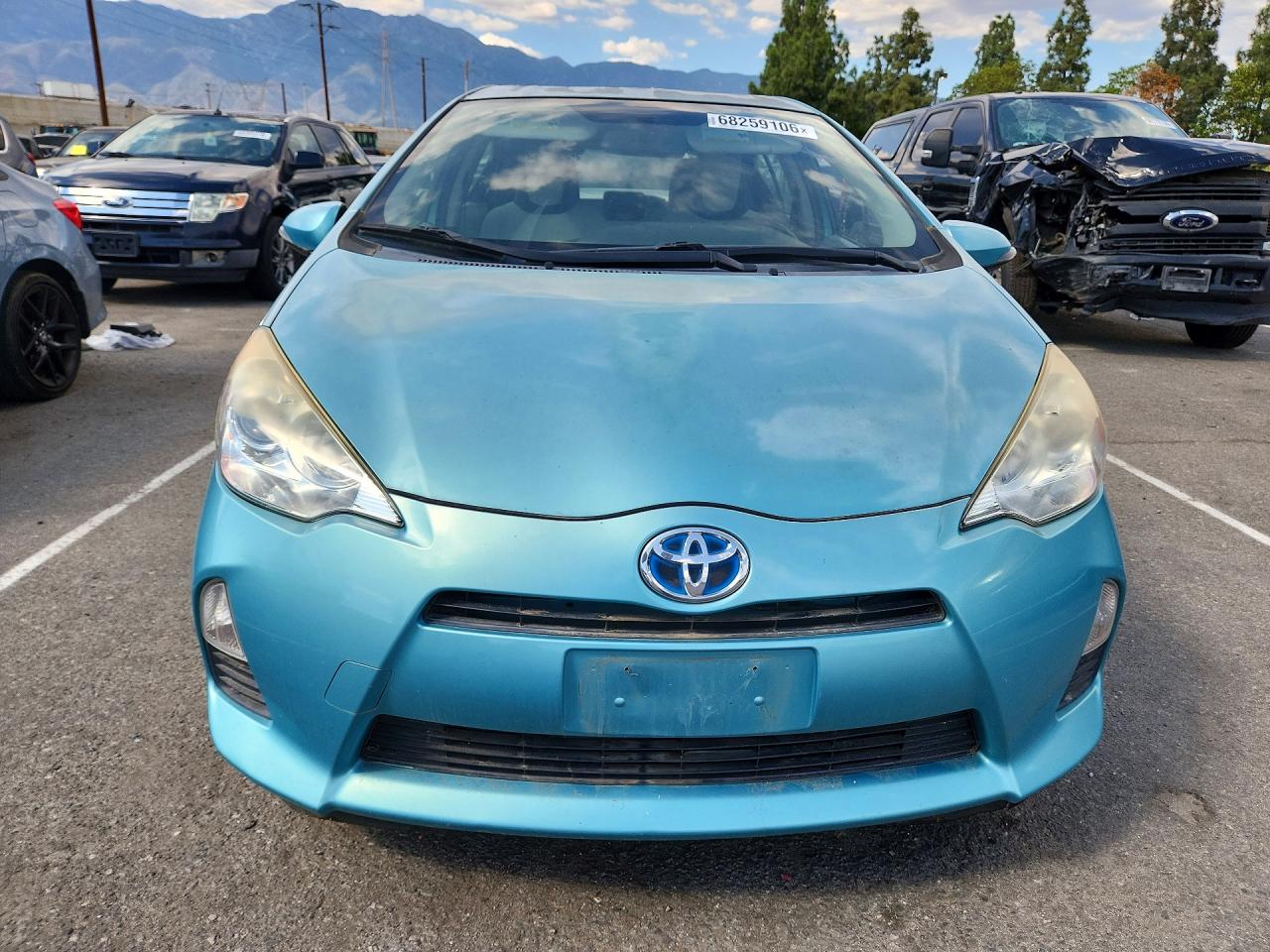 2014 Toyota Prius C One Turquoise vin: JTDKDTB37E1077844