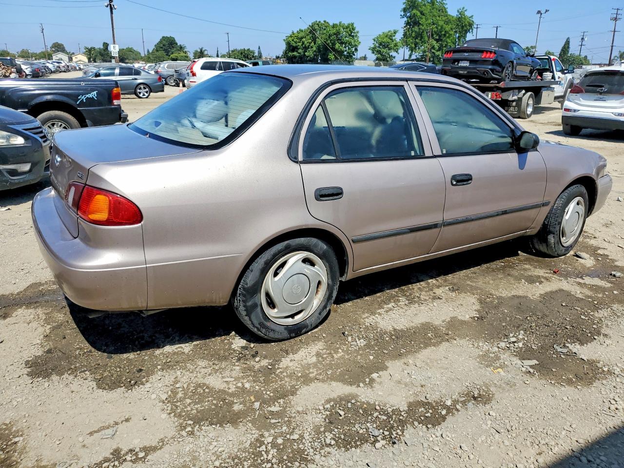 1998 Toyota Corolla Ve Tan vin: 1NXBR12EXWZ117823