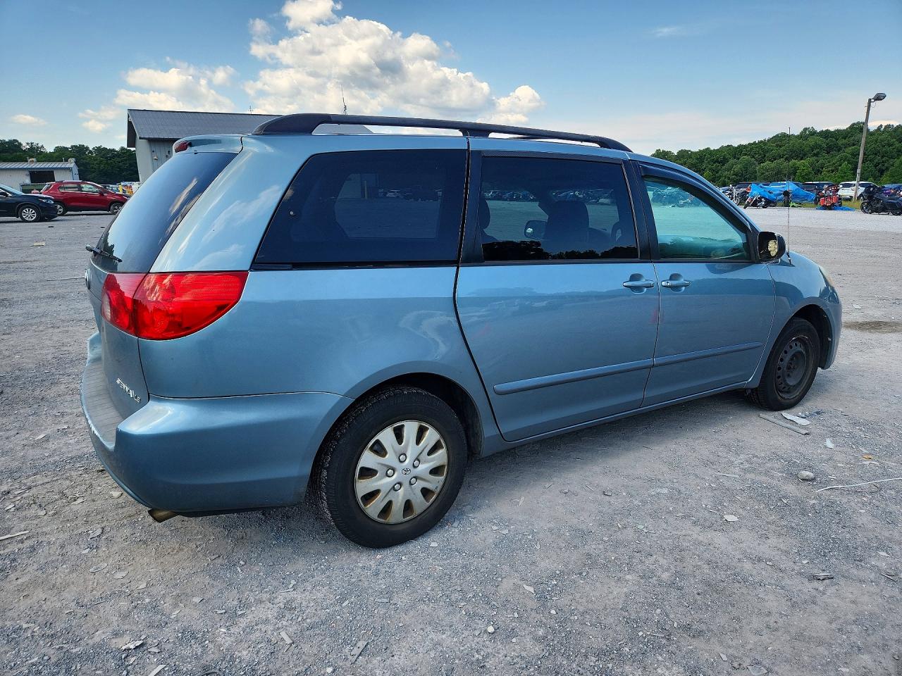 2009 Toyota Sienna Le 7-passenger Blue vin: 5TDZK23C69S245883