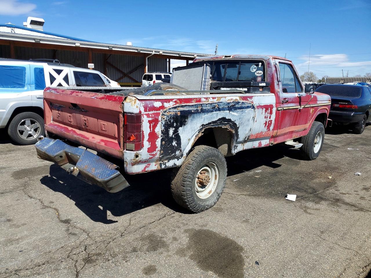 1985 Ford F250 Red vin: 1FTHF2614FPB38556