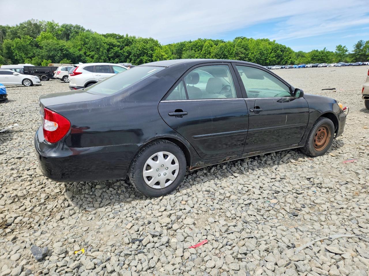 2004 Toyota Camry Le Black vin: JTDBE32K140261377