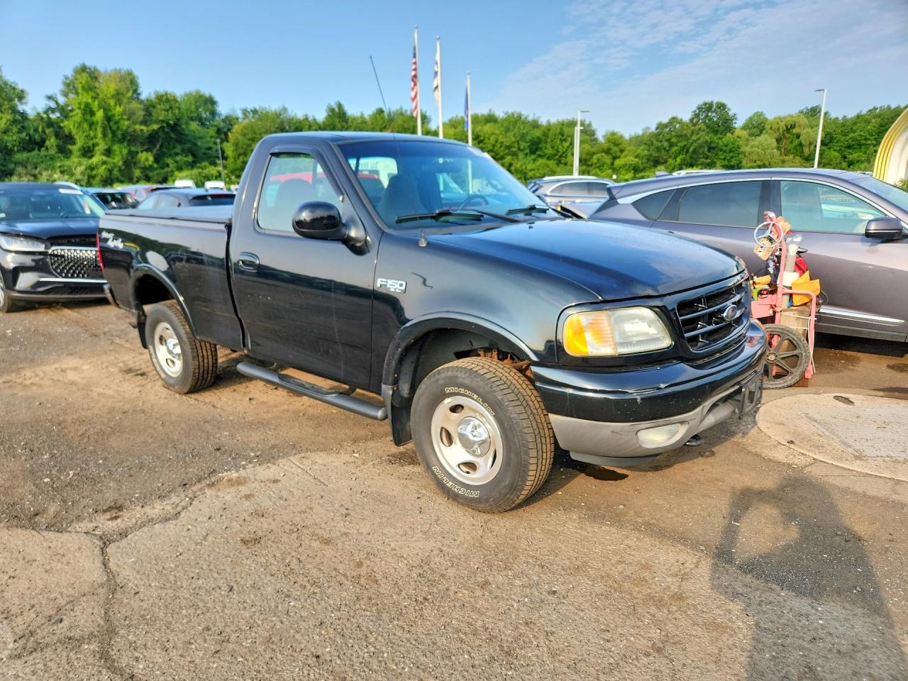 2002 Ford F150 Black vin: 1FTRF182X2NA47575