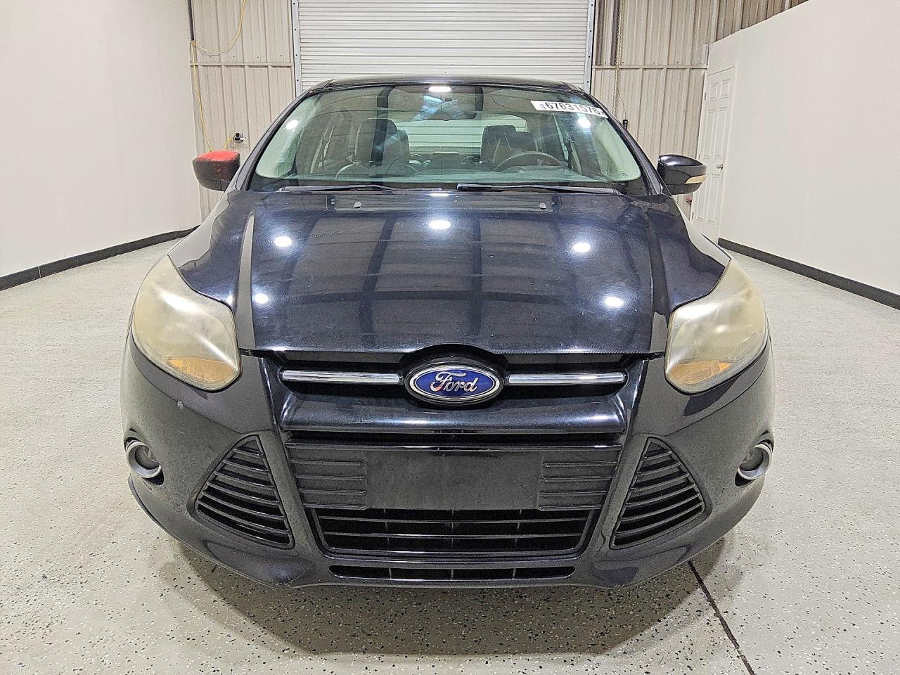 2014 Ford Focus Titanium Black vin: 1FADP3J29EL104156