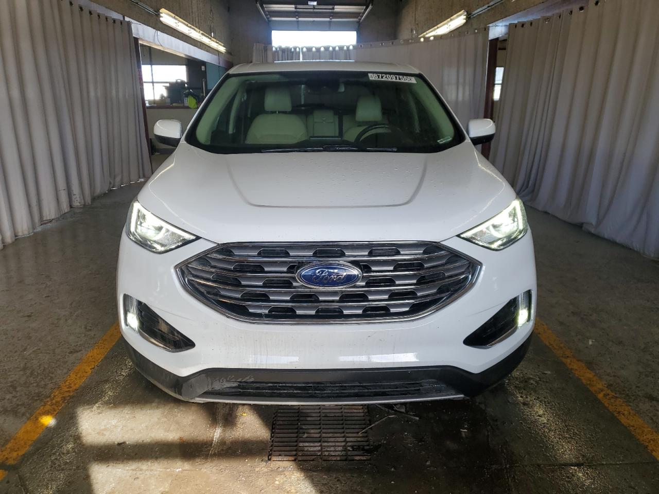 2021 Ford Edge Sel White vin: 2FMPK4J94MBA59369 Damage: Front Bumper, Heavy Scratch, 1/2 To 1 Inch