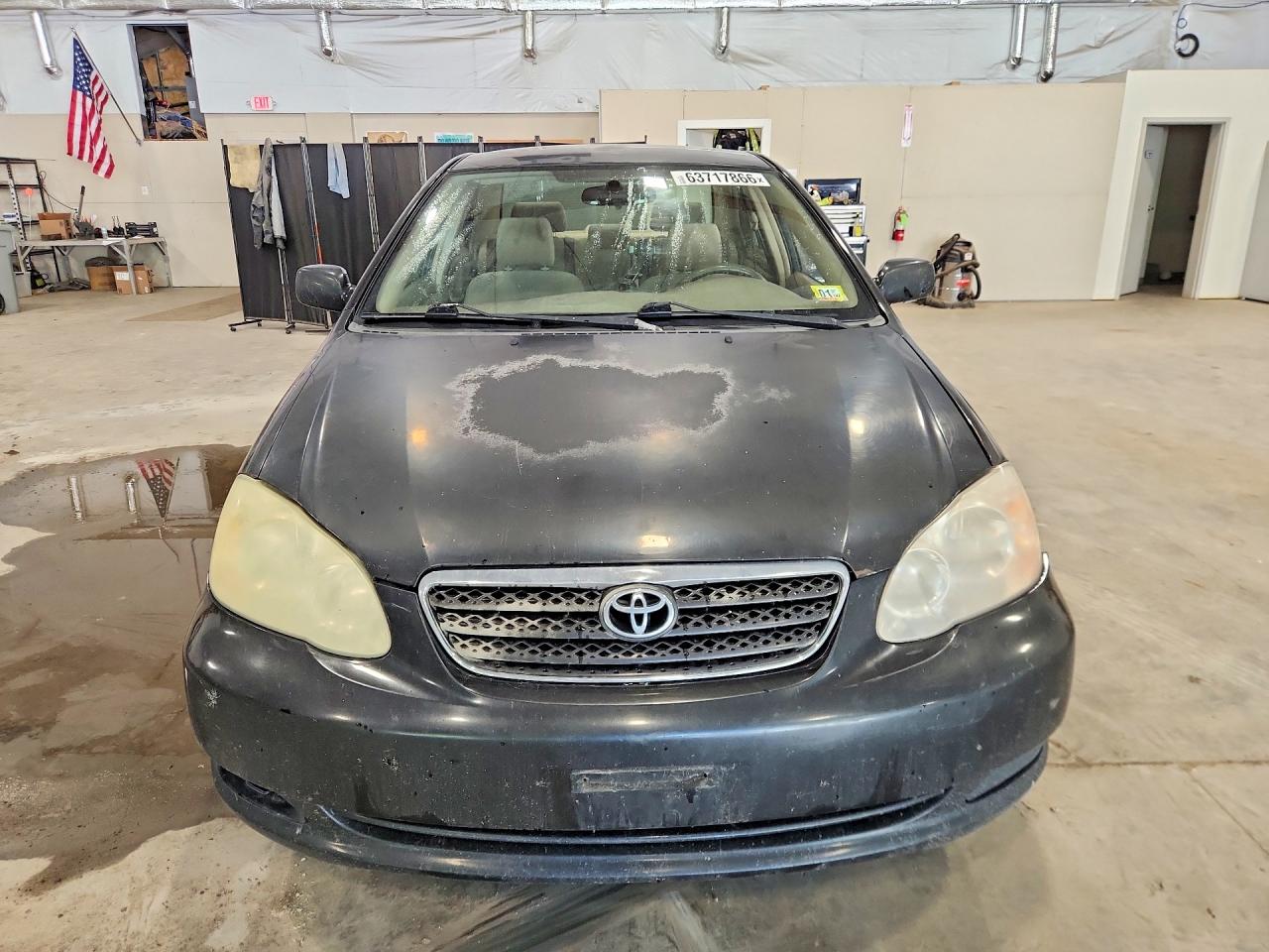 2005 Toyota Corolla Le Black vin: JTDBR32EX50057368