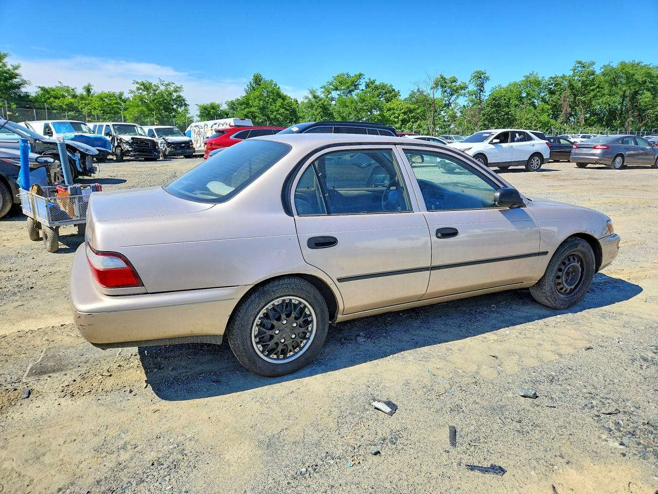 1997 Toyota Corolla Base Gold vin: 2T1BA02EXVC176906