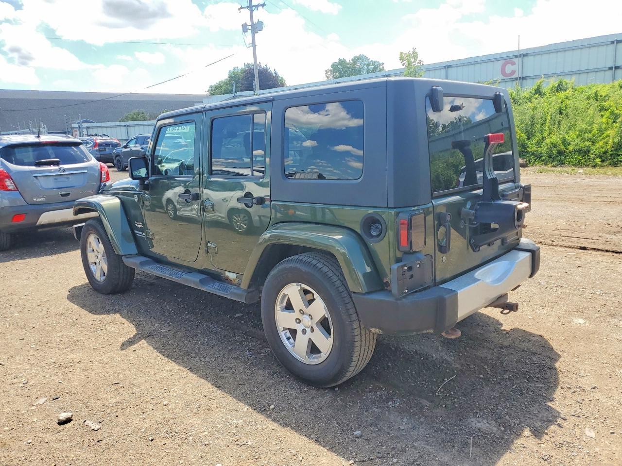 2009 Jeep Wrangler Unlimited Sahara Green vin: 1J4GA59159L733168