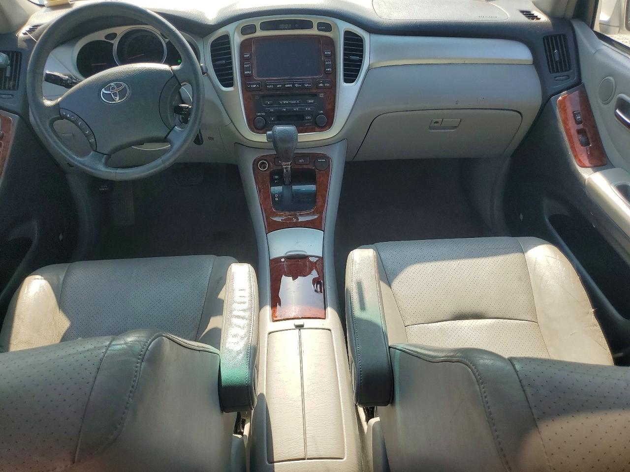 2006 Toyota Highlander Hybrid Gold vin: JTEEW21A860021738