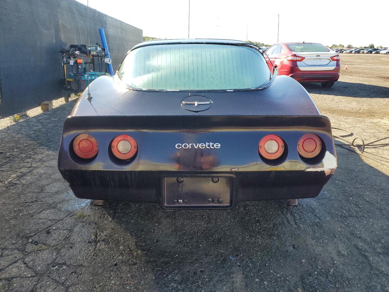 1986 Chevrolet Corvette Purple vin: M10017A235X051986 Damage: Rear Bumper, Peeling, 5 to 6 inches