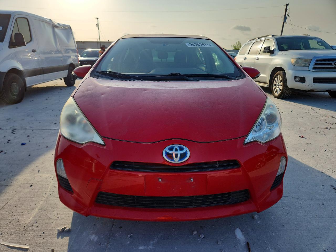 2012 Toyota Prius C Two Red vin: JTDKDTB31C1503220