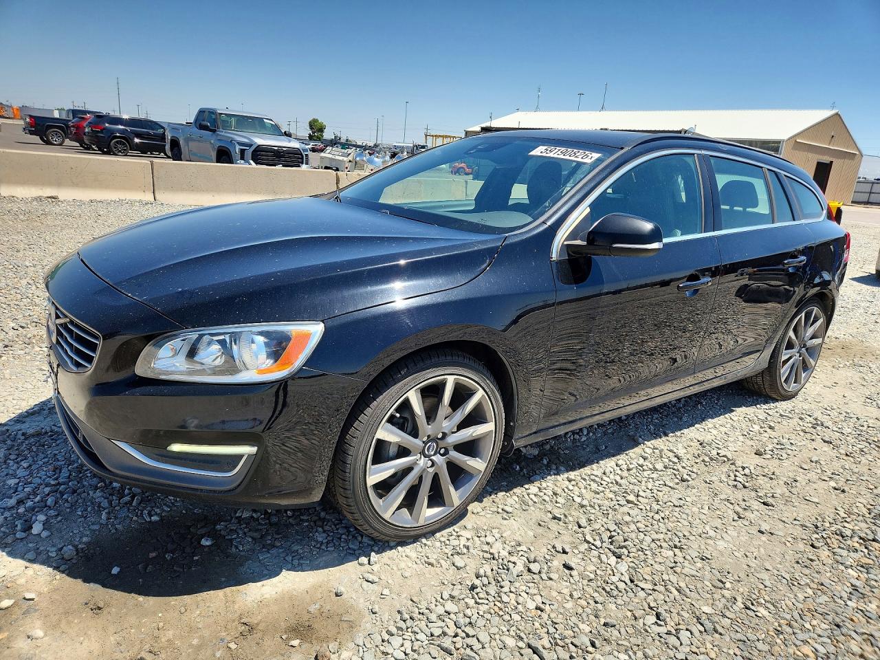 2015 Volvo V60 Premier Black vin: YV1612SB4F1189766