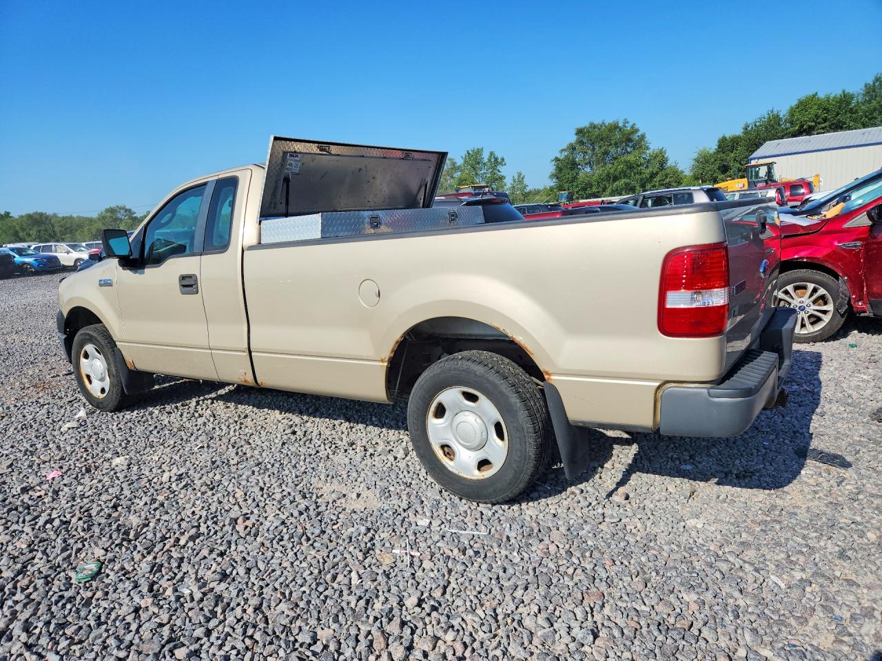 2007 Ford F150 Gold vin: 1FTRF12297NA25258