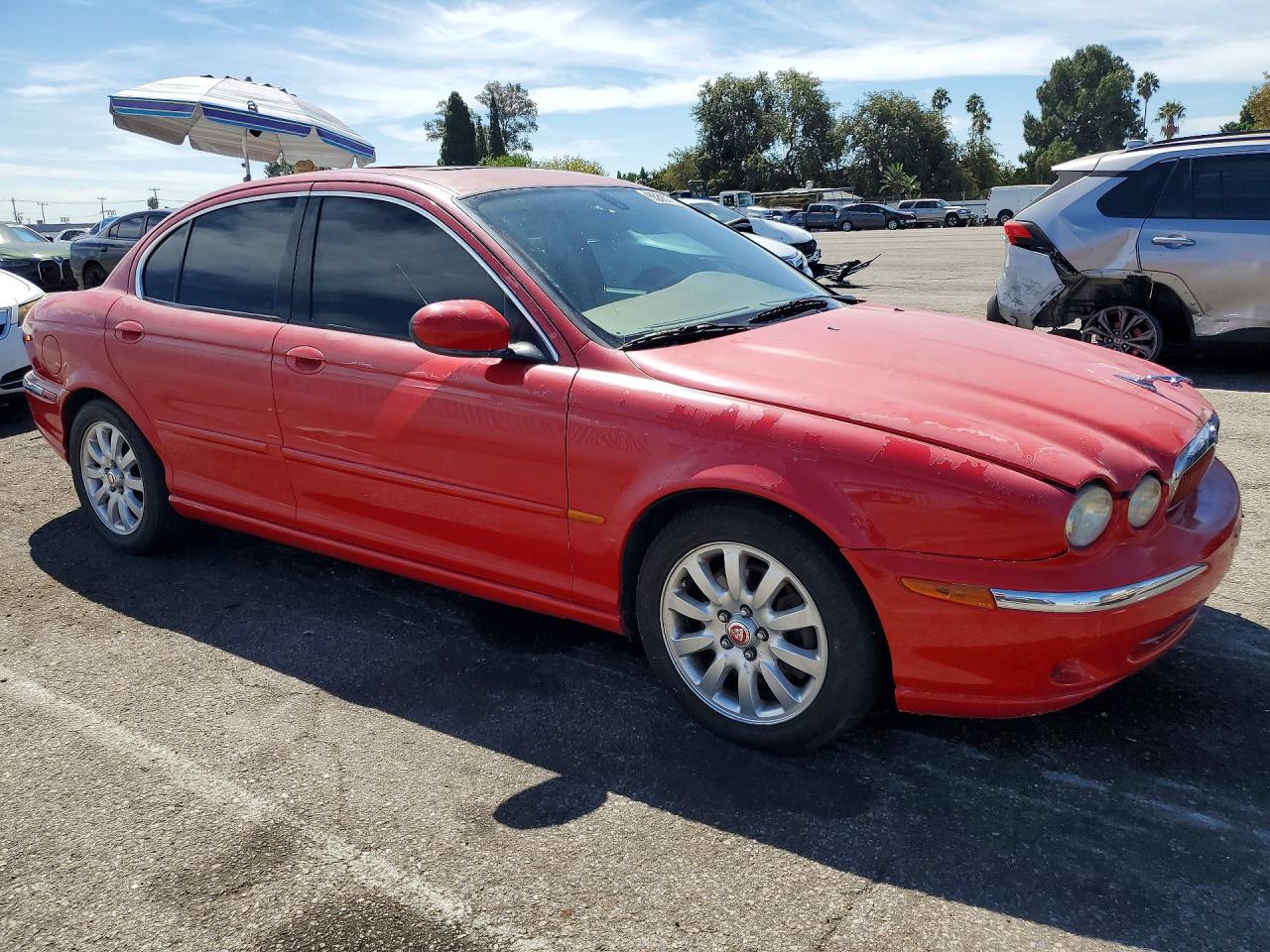 2003 Jaguar X-type 2.5 Red vin: SAJEA51D33XC86945