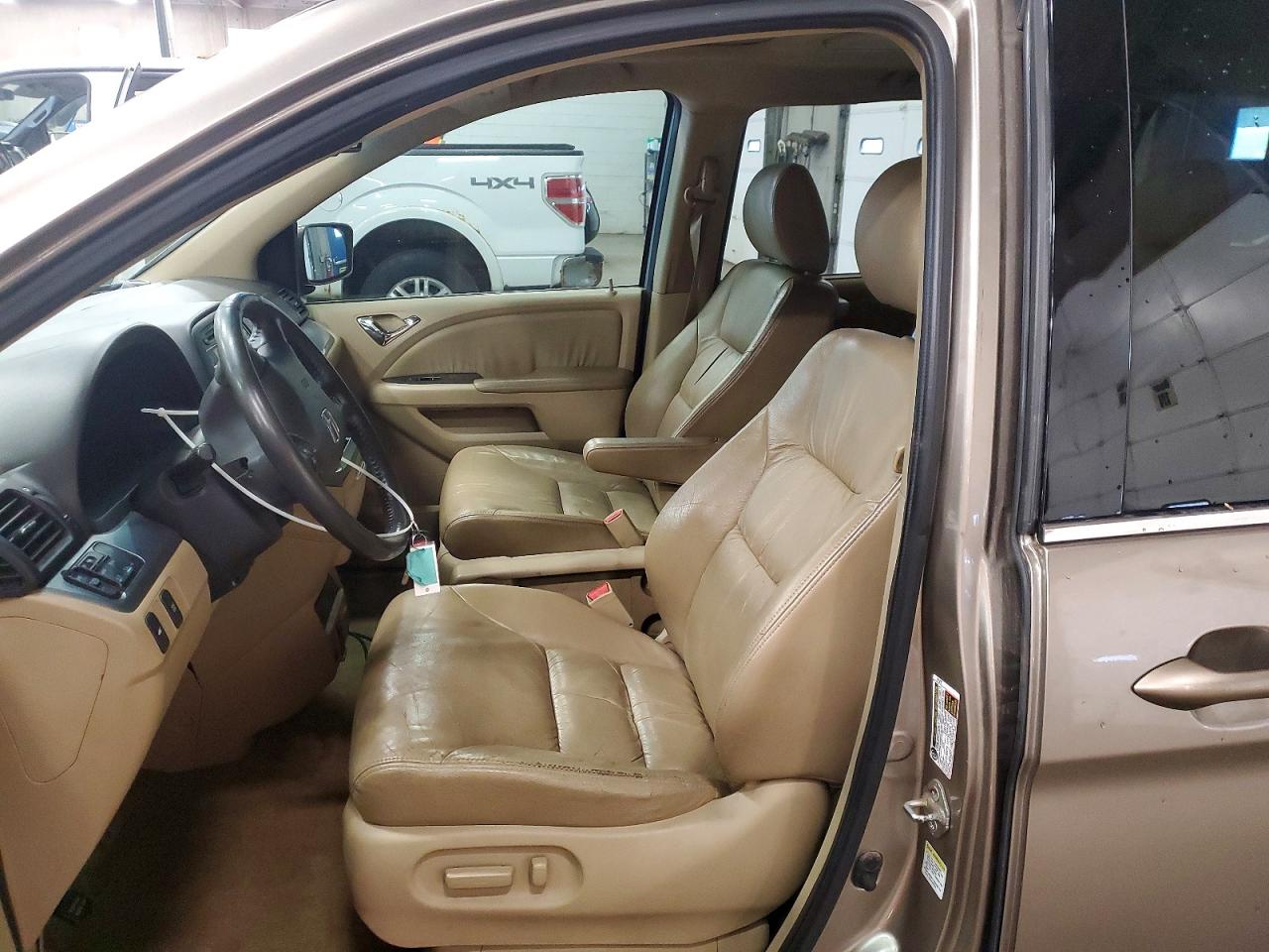 2010 Honda Odyssey Exl Beige vin: 5FNRL3H74AB033359