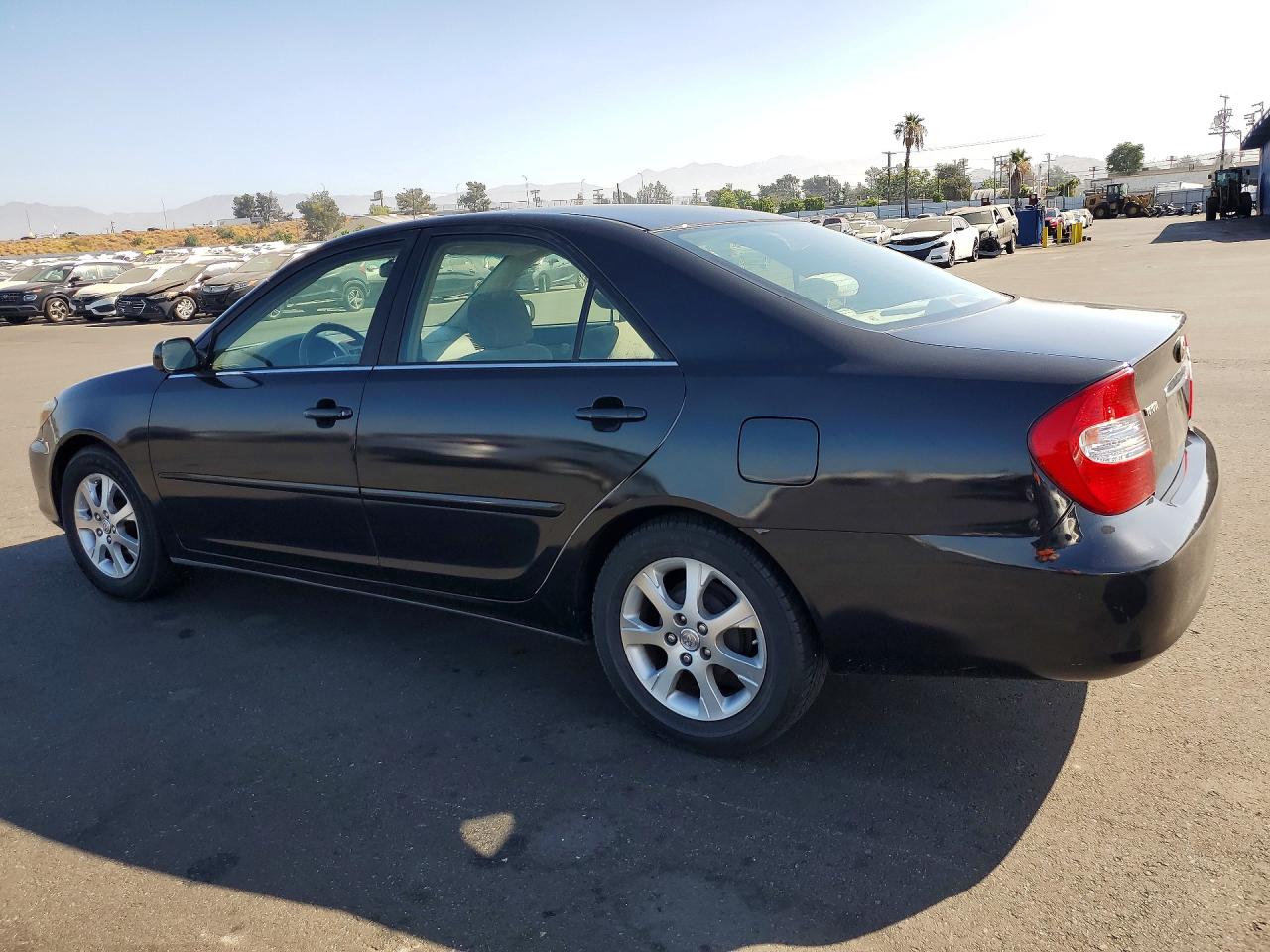 2004 Toyota Camry Le Black vin: JTDBE30K140279025