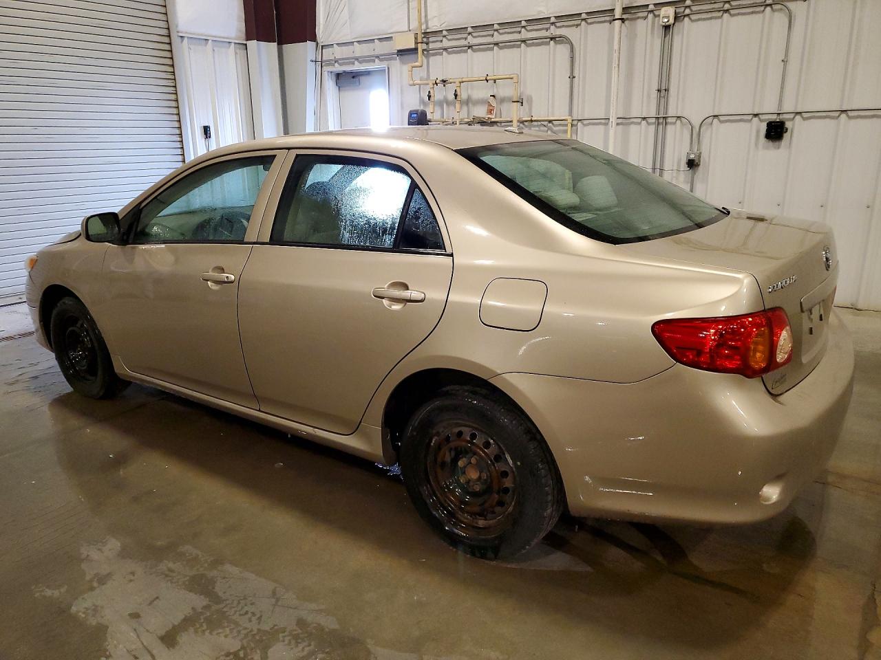 2009 Toyota Corolla Le Gold vin: 1NXBU40E79Z105085