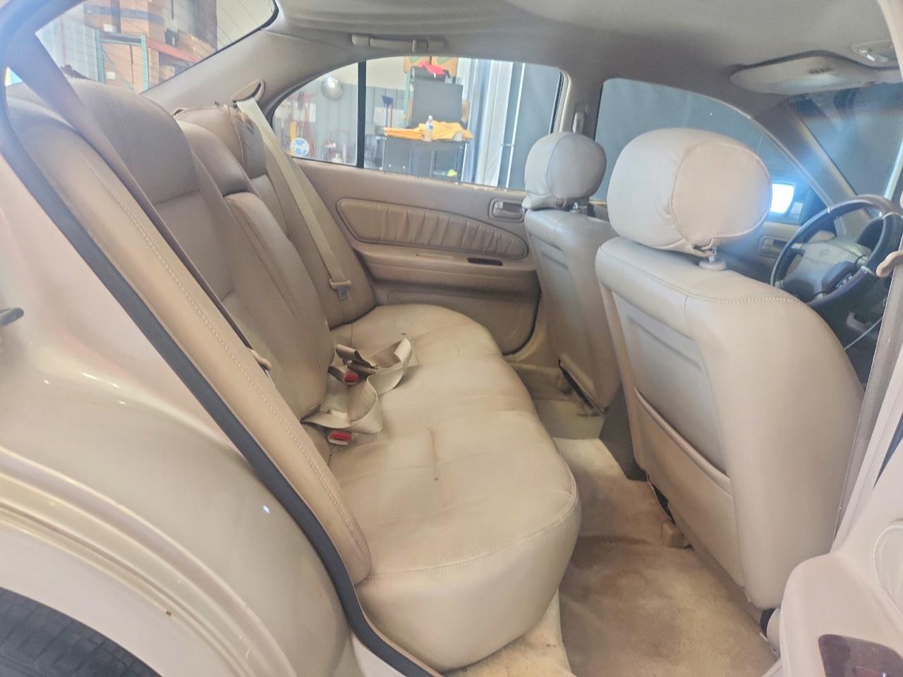 1998 Nissan Maxima Gxe Tan vin: JN1CA21D3WM916456