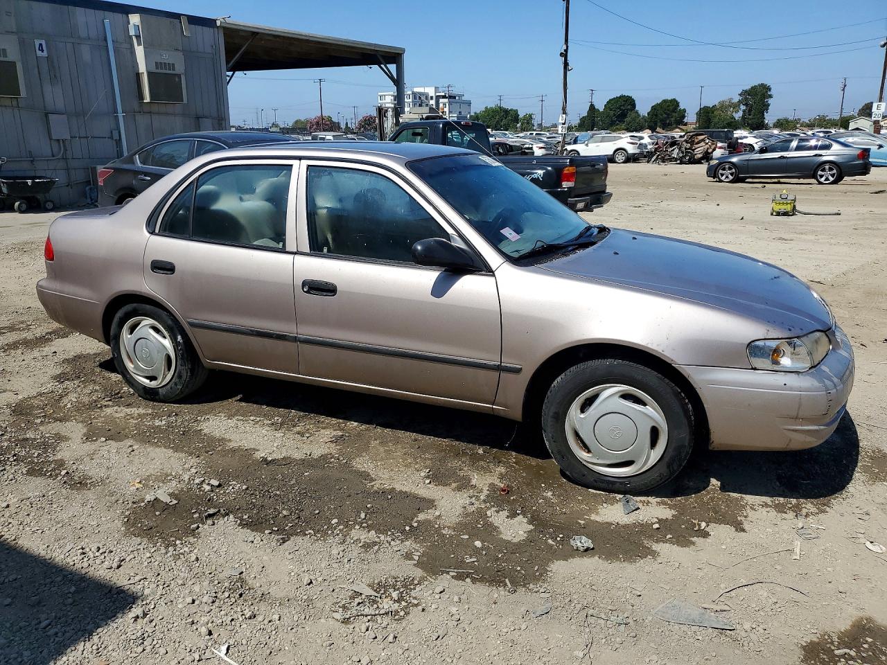 1998 Toyota Corolla Ve Tan vin: 1NXBR12EXWZ117823