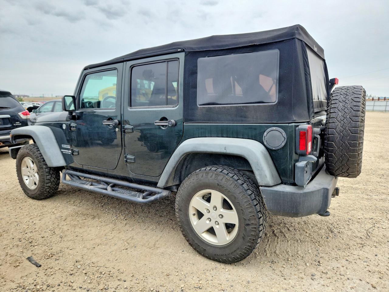 2012 Jeep Wrangler Unlimited Sport Green vin: 1C4BJWDG3CL100399