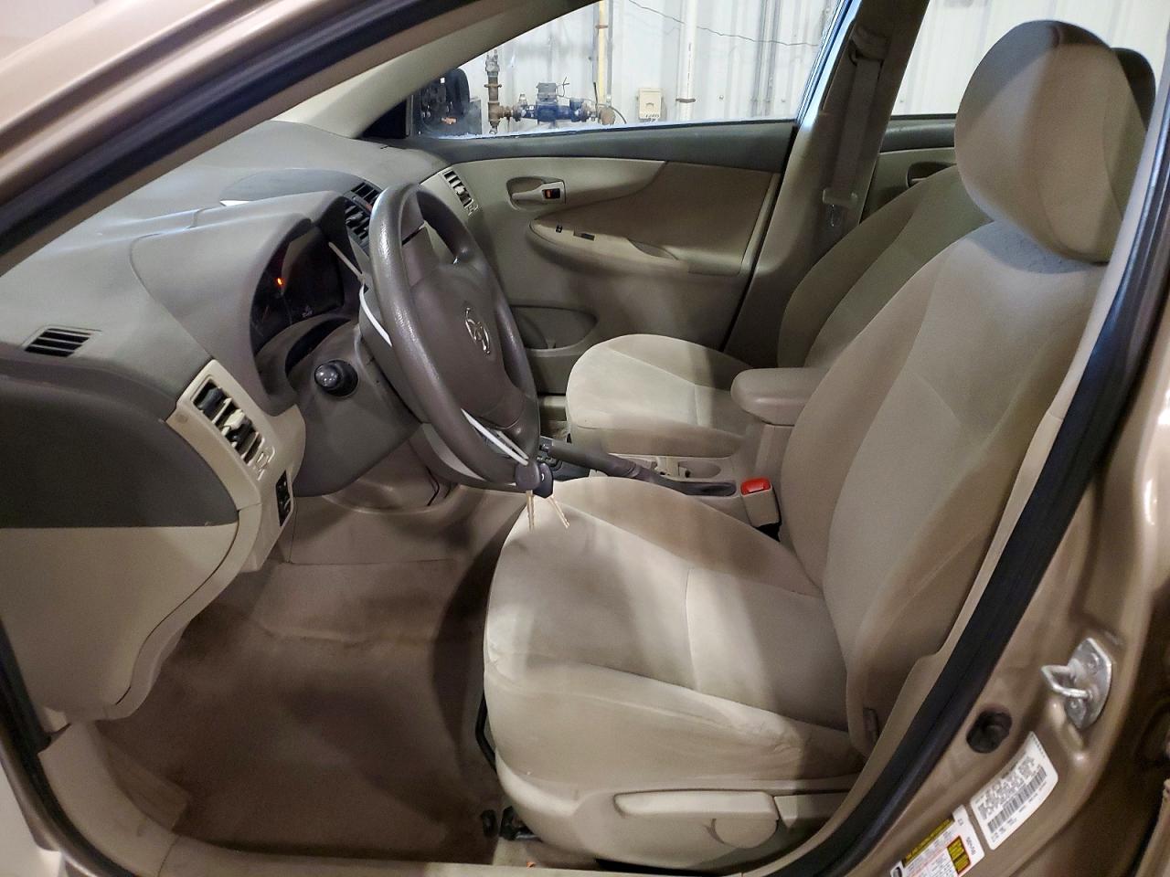 2009 Toyota Corolla Le Gold vin: 1NXBU40E79Z105085
