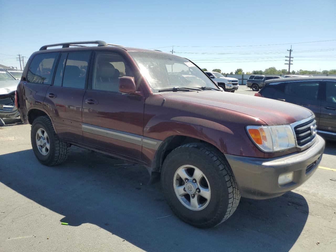 1999 Toyota Land Cruiser    Burgundy vin: JT3HT05JXX0048695