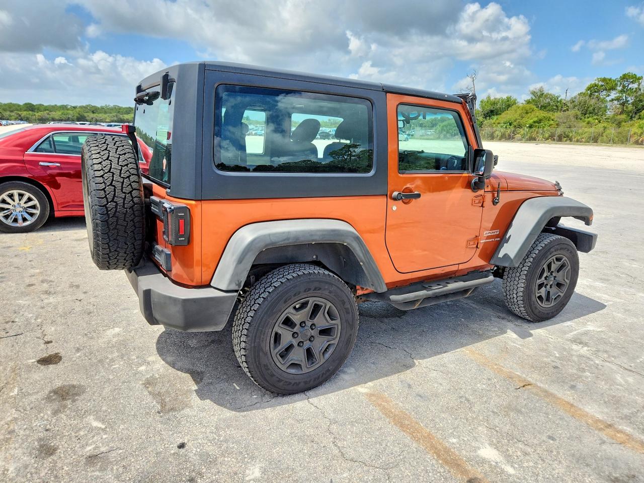 2011 Jeep Wrangler Sport Orange vin: 1J4AA2D16BL574551