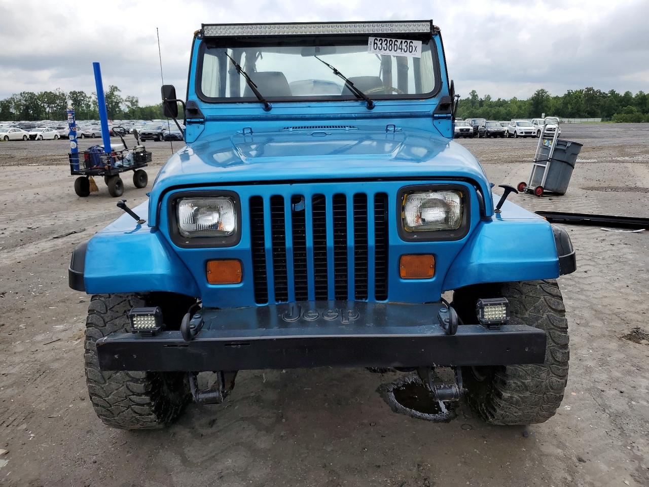 1994 Jeep Wrangler / Yj Sahara Blue vin: 1J4FY49S2RP421926