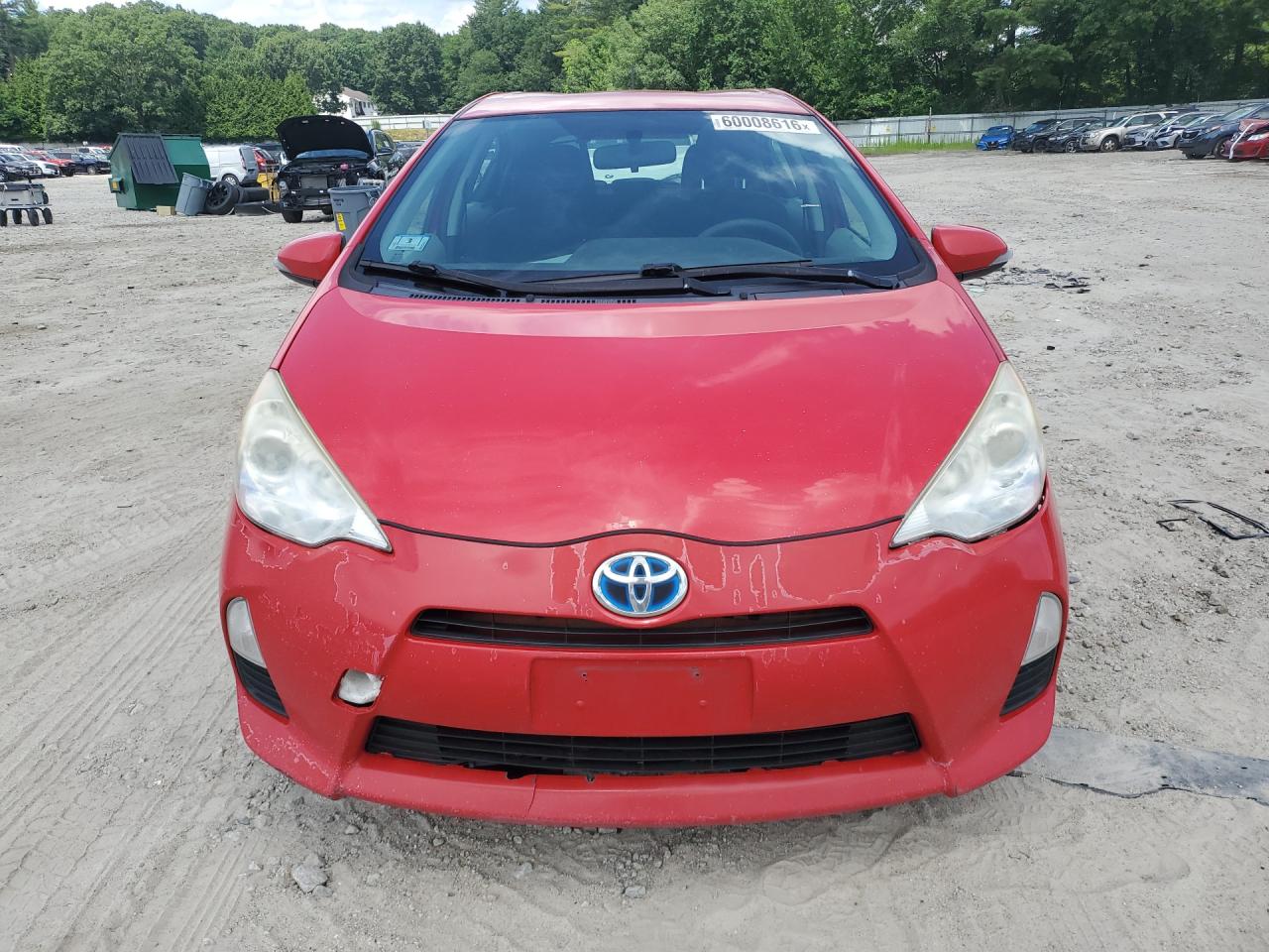 2012 Toyota Prius C Three Red vin: JTDKDTB31C1021590