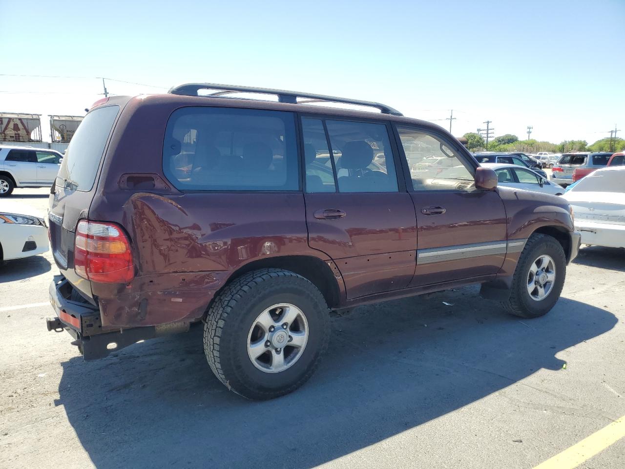 1999 Toyota Land Cruiser    Burgundy vin: JT3HT05JXX0048695
