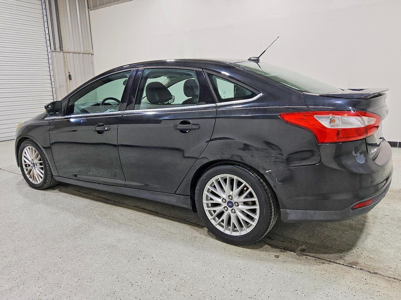 2014 Ford Focus Titanium Black vin: 1FADP3J29EL104156