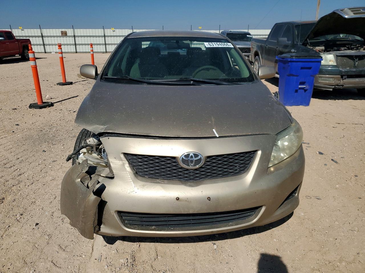 2009 Toyota Corolla Le Tan vin: 1NXBU40E69Z158148