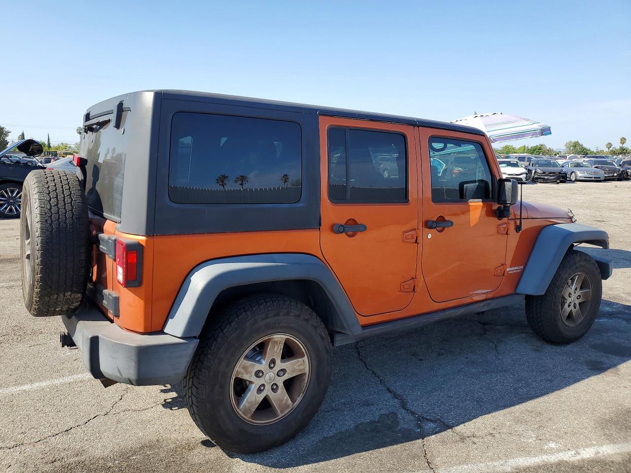 2011 Jeep Wrangler Unlimited Sport Оранжевый vin: 1J4HA3H13BL520624