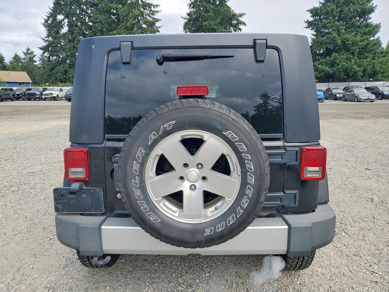 2010 Jeep Wrangler Unlimited Sahara Black vin: 1J4BA5H16AL115230