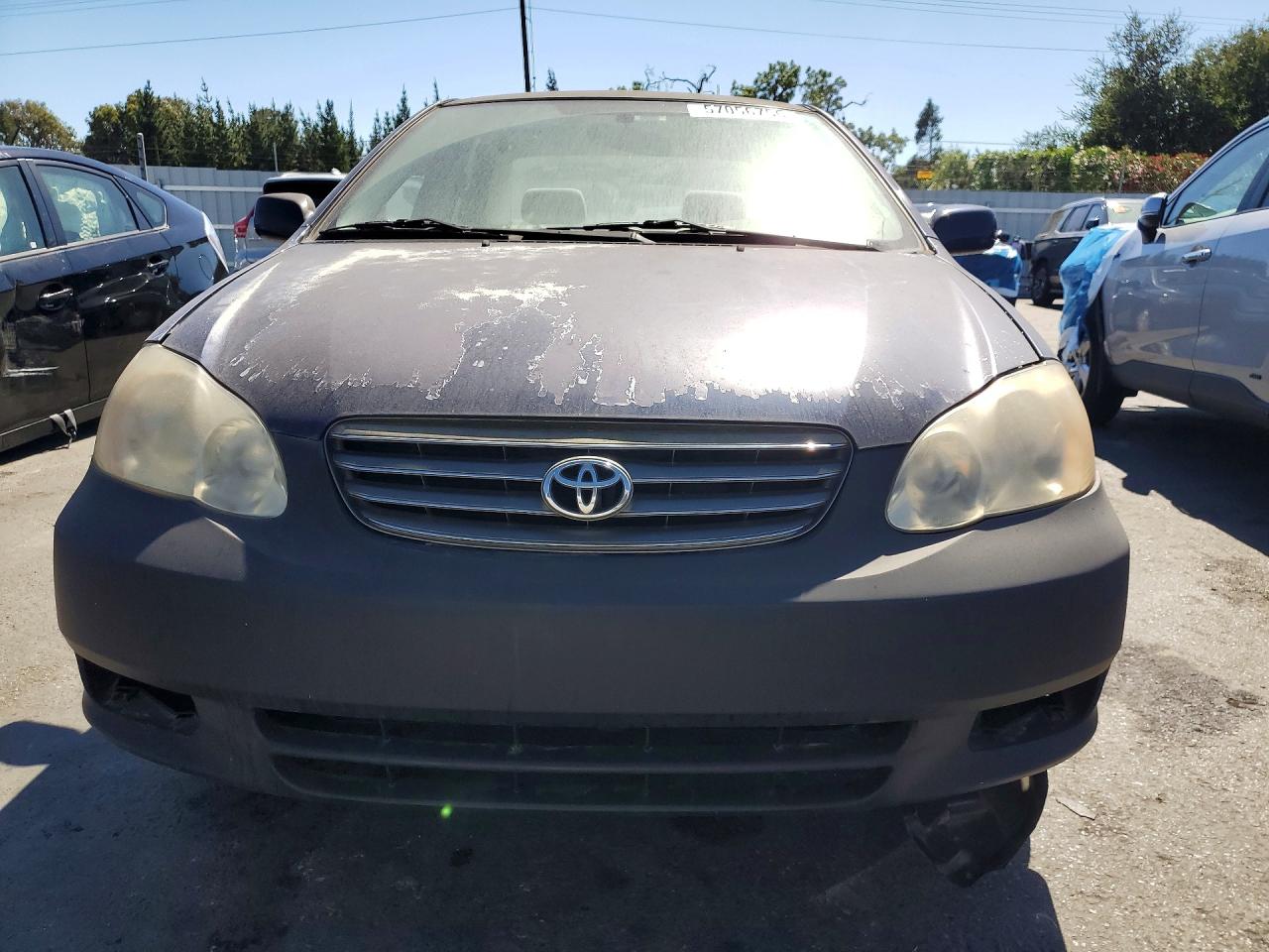 2004 Toyota Corolla Le Blue vin: 1NXBR32E84Z260617