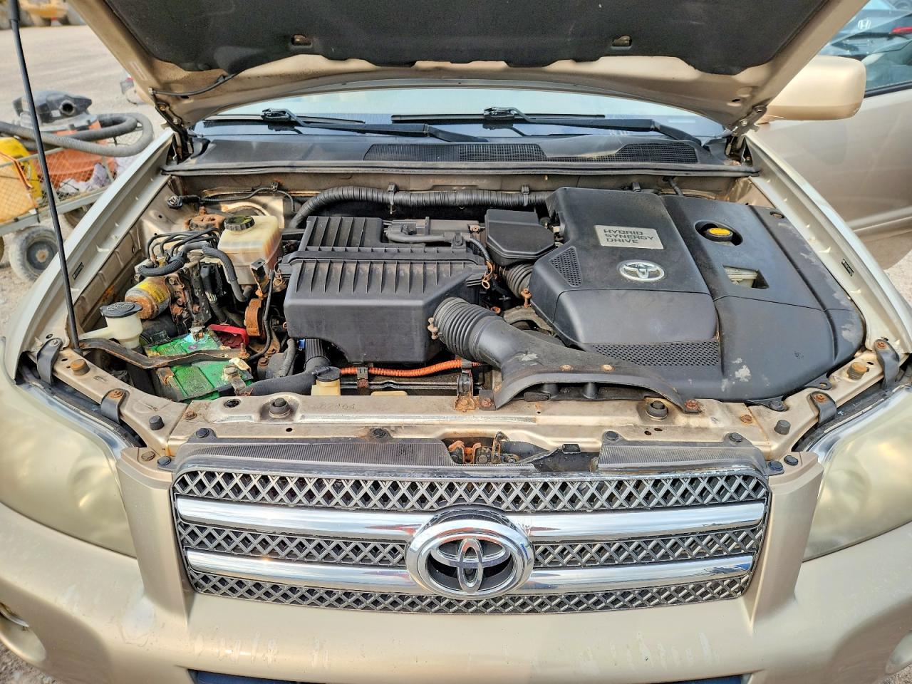 2006 Toyota Highlander Hybrid Gold vin: JTEEW21A460006749