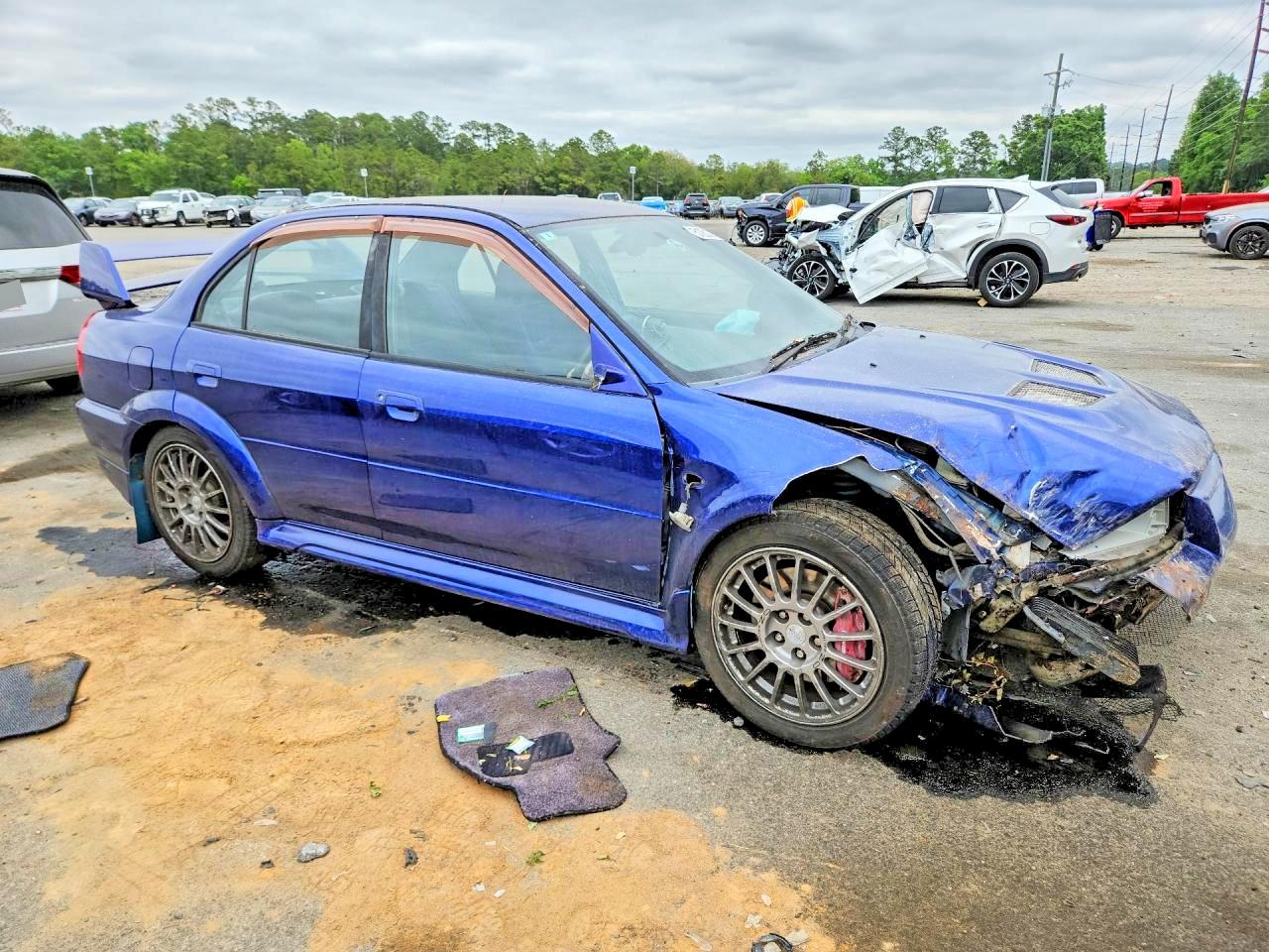 1999 Mitsubishi Lancer Evolution Blue vin: CP9A0101502