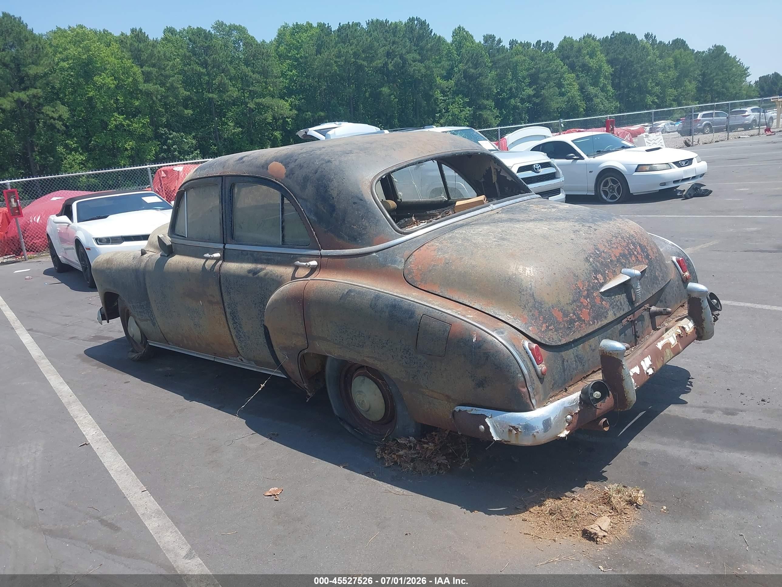 1950 Chevrolet Sedan   Black vin: HAM-49765314HJJ44