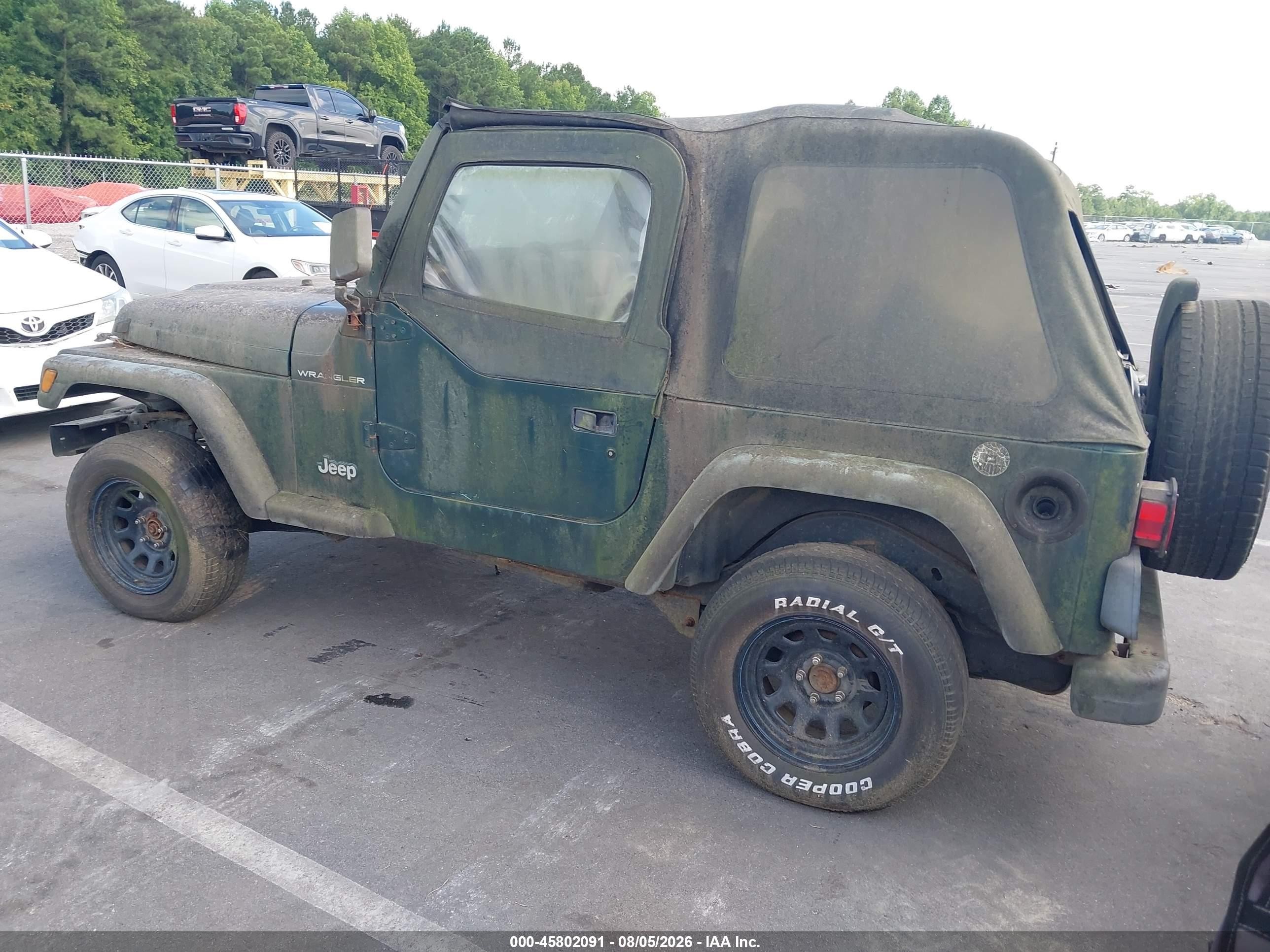 2000 Jeep Sw   Green vin: IJ4FA29P1YP709157