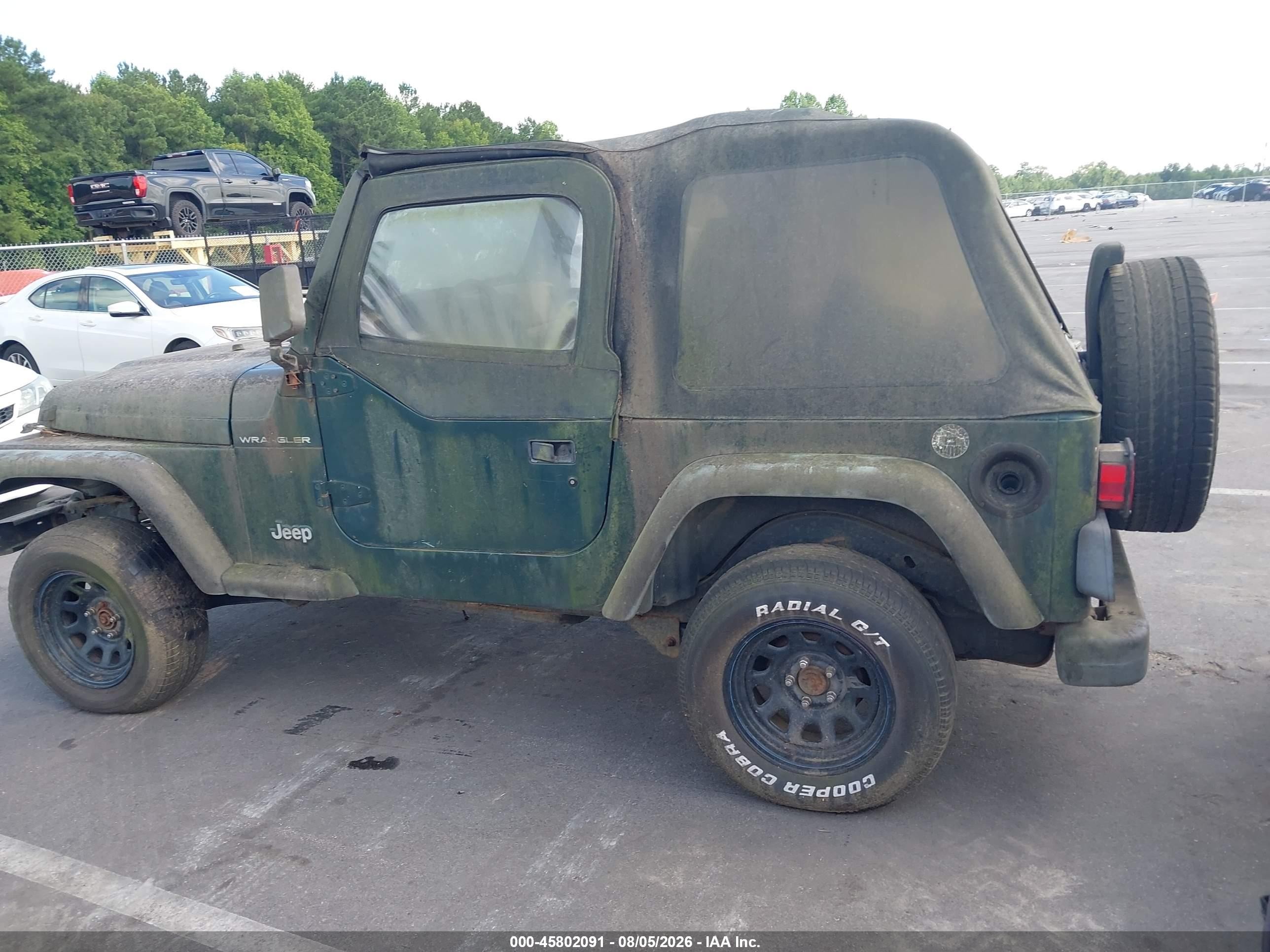 2000 Jeep Sw   Green vin: IJ4FA29P1YP709157
