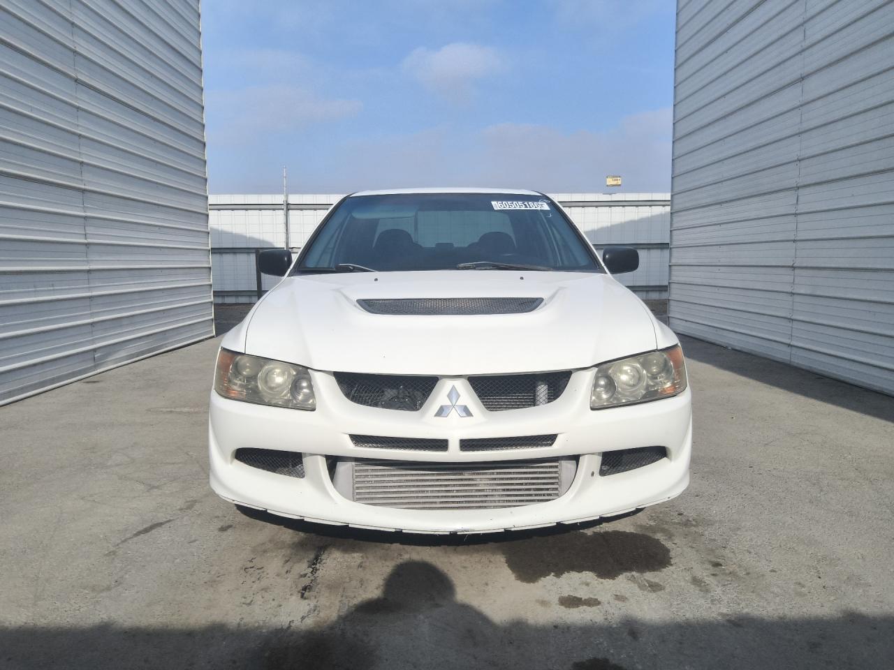 2005 Mitsubishi Lancer Evolution Rs White vin: JA3AH36D75U044942 Damage: Front Bumper Extension, Missing, Replacement Required